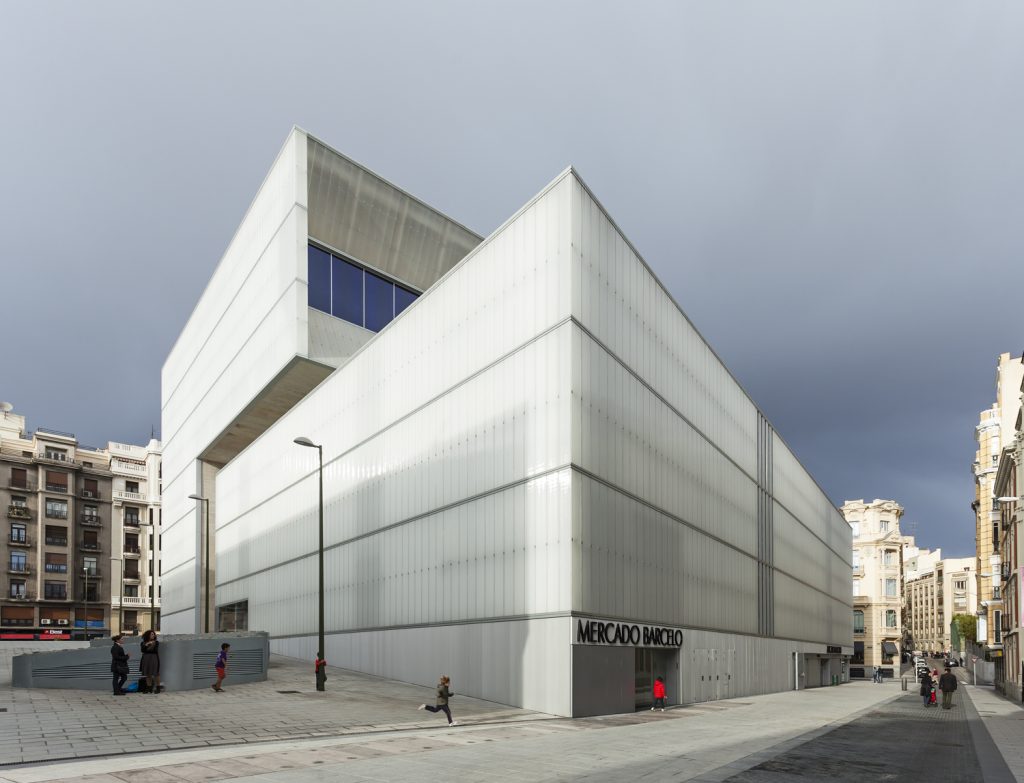 Barceló Market - Nieto Sobejano - Modern, geometric building stands prominently in an urban setting