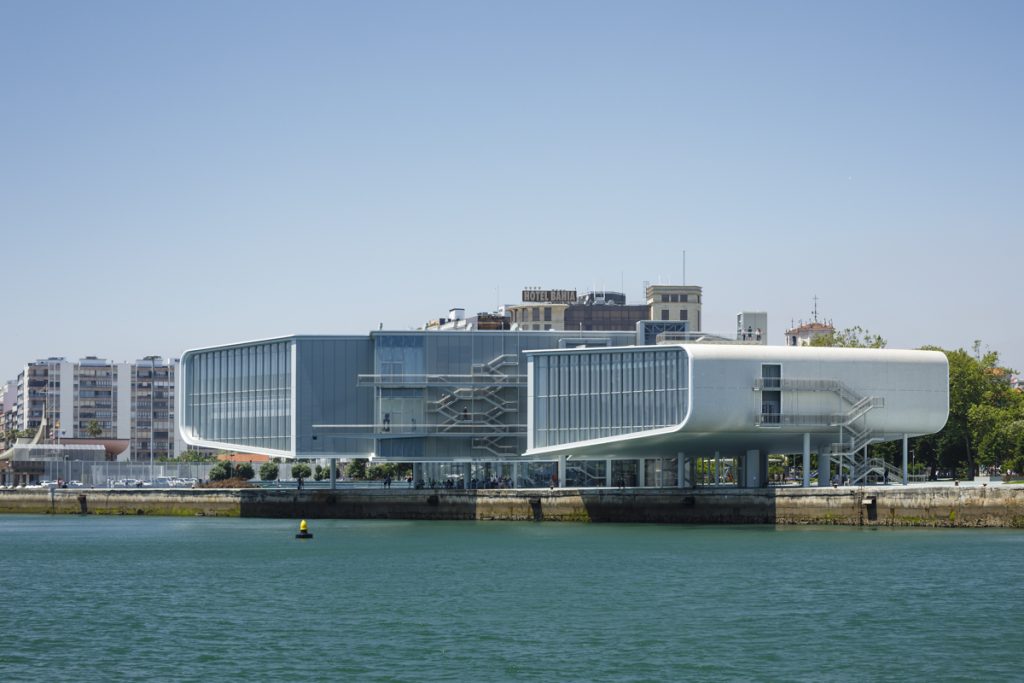 Centro Botín - Renzo Piano Building Workshop - Large white building with glass facade next to water
