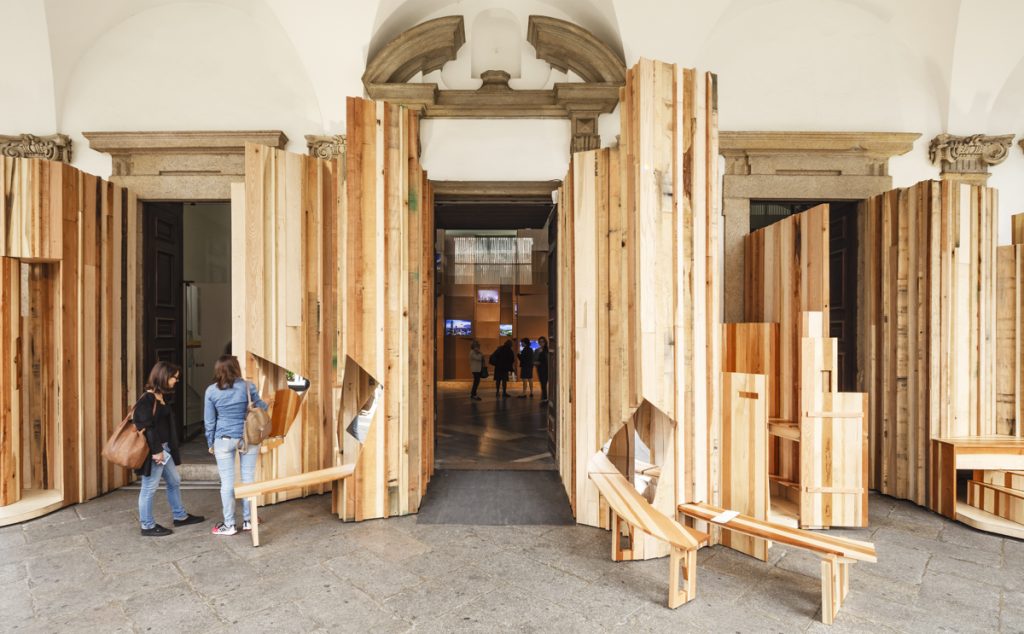 Too Good To Waste - EMBT Architects - Modern wooden installation within a classical architectural setting, where people engage and explore